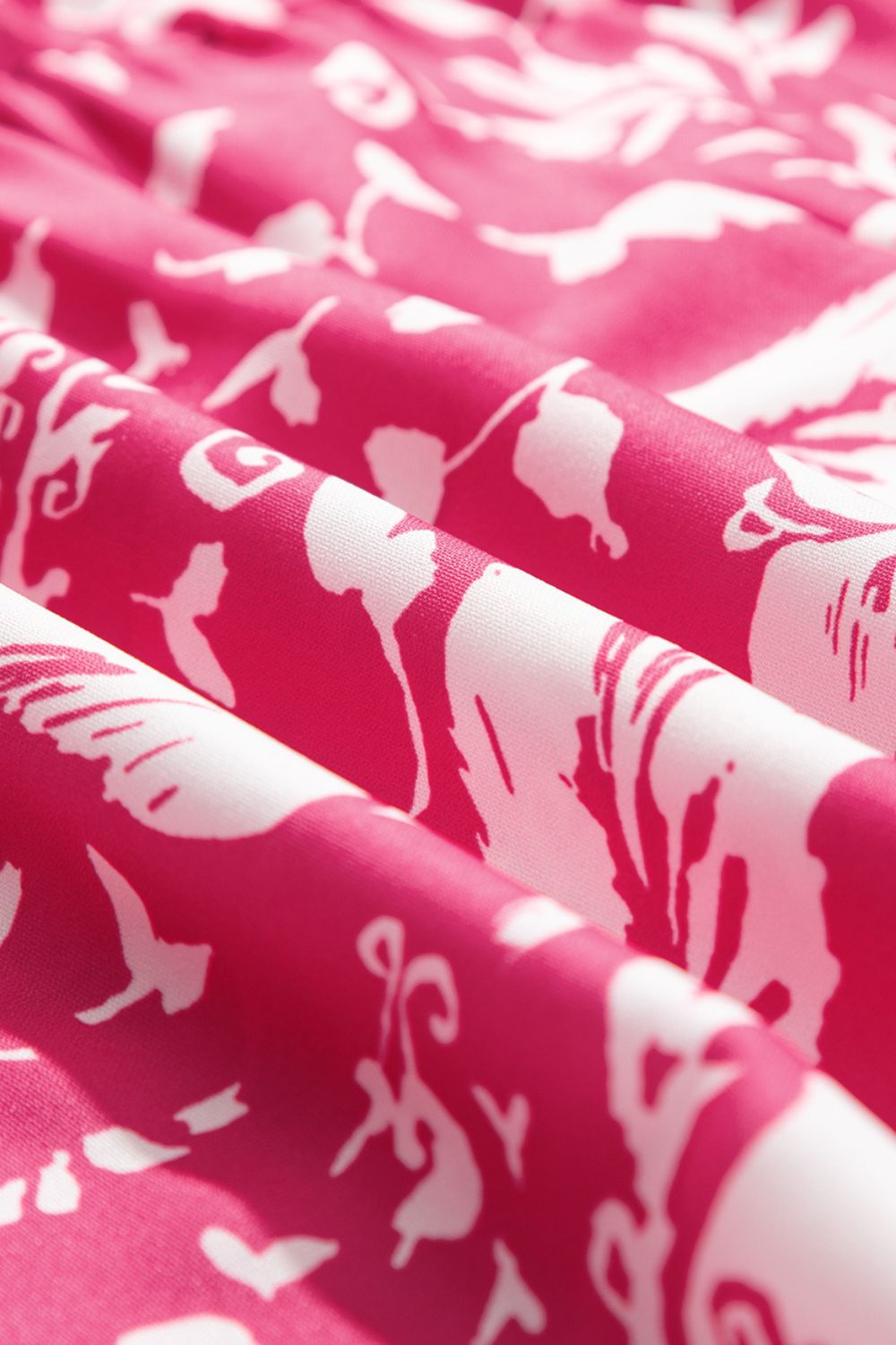 Noor - rosa ärmellos bio Druck Weites Tunika-Midikleid mit Knöpfen V-Ausschnitt