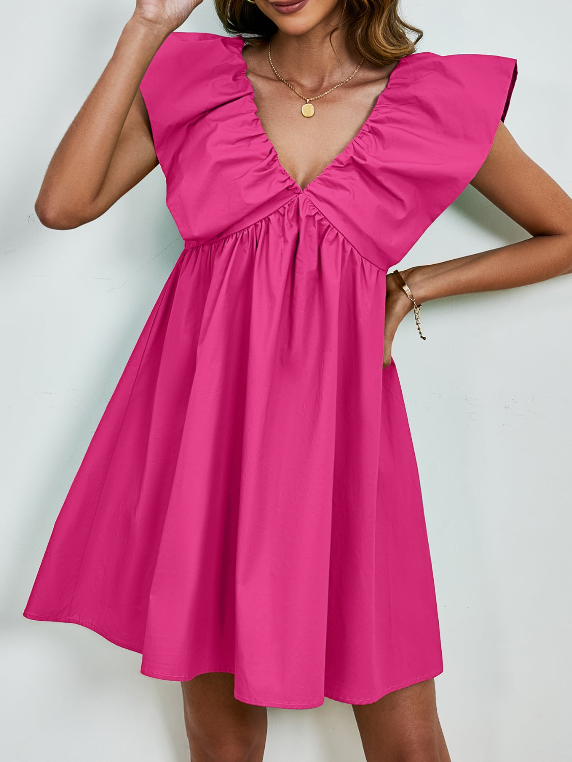 Femke - Minikleid mit V-Ausschnitt, Kappenärmeln und weitem Rock in leuchtender Solide Farbe