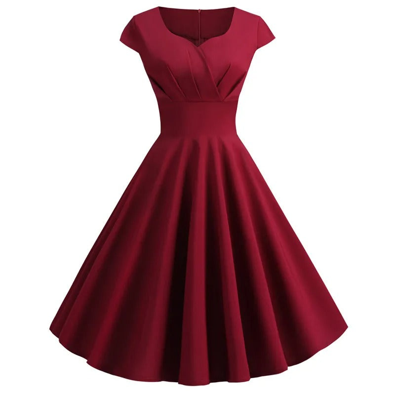 Merry - Vintage Sommerkleid mit großem V-Ausschnitt, weitem Schnitt und Rüschen