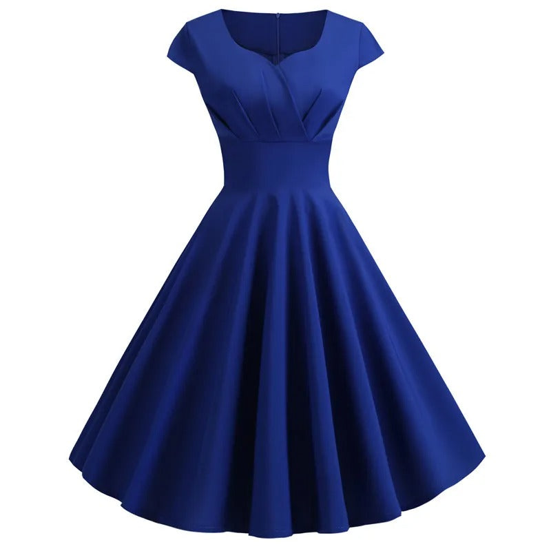 Merry - Vintage Sommerkleid mit großem V-Ausschnitt, weitem Schnitt und Rüschen