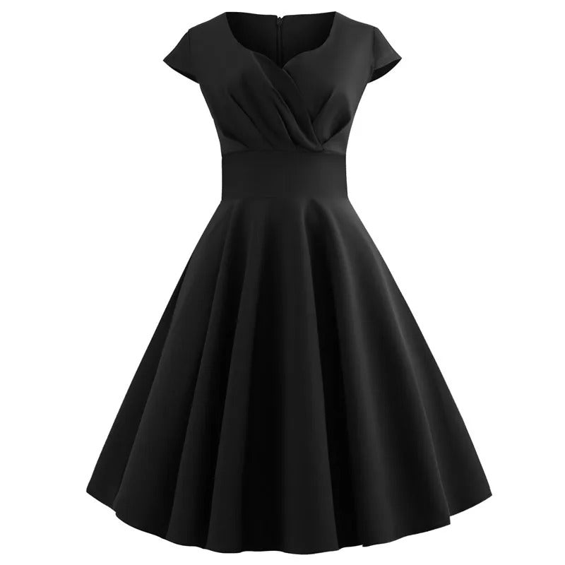 Merry - Vintage Sommerkleid mit großem V-Ausschnitt, weitem Schnitt und Rüschen