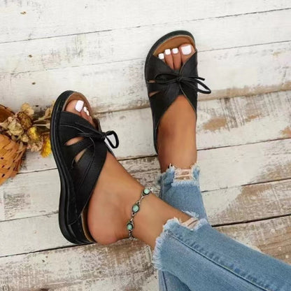Anneke - Bequeme vegane Ledersandalen mit offener Spitze und niedrigem Absatz und Schleife