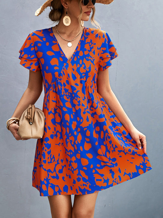 Sophie - Abstraktes Drucken Kleid mit V-Ausschnitt in Blau und Orange