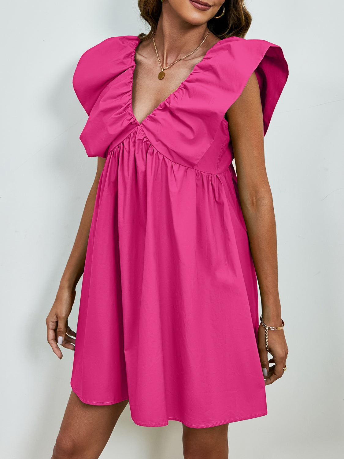 Mia - Kleid mit V-Ausschnitt und Puffärmeln