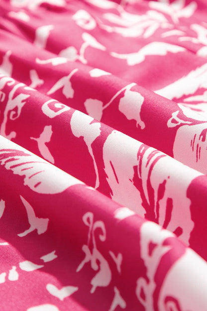 Noor - rosa ärmellos bio Druck Weites Tunika-Midikleid mit Knöpfen V-Ausschnitt