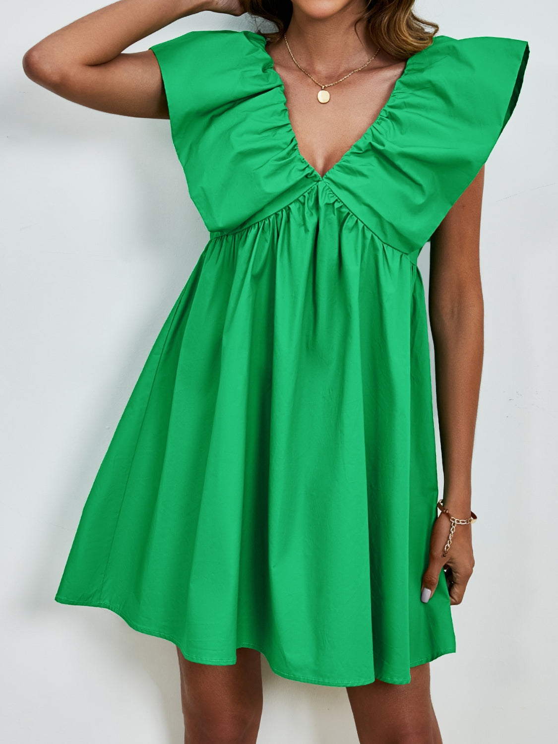 Mia - Kleid mit V-Ausschnitt und Puffärmeln