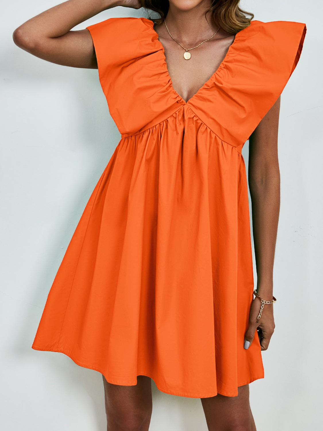 Mia - Kleid mit V-Ausschnitt und Puffärmeln