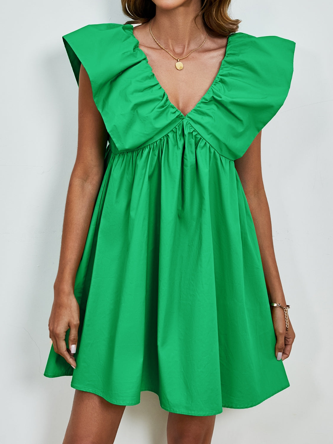 Mia - Kleid mit V-Ausschnitt und Puffärmeln