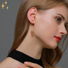 Mirabella Shopping 200000168 Rubinrot Mirabella™ Kolibri-Ohrringe | Originell und schön neben dem Gesicht