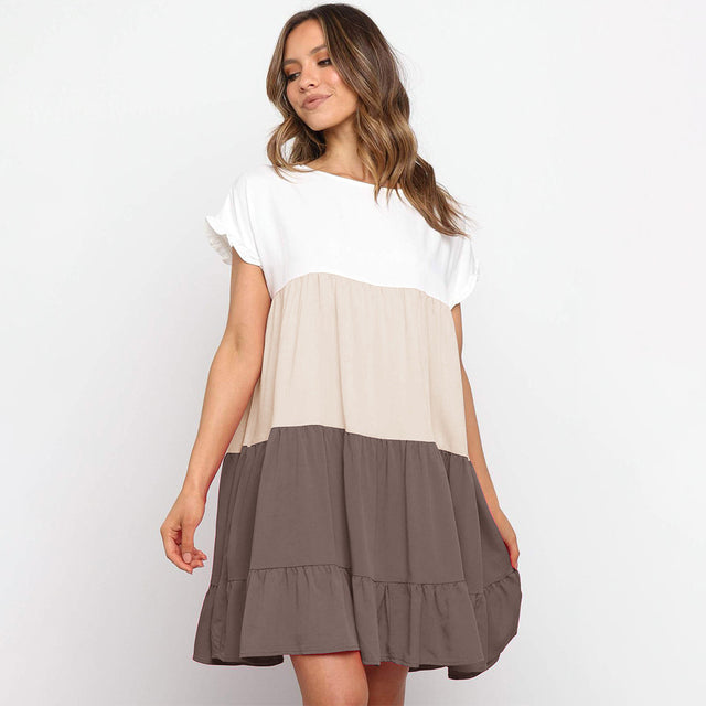 Jovita - Schattierungen des Sonnenuntergangs:  Verspieltes Kleid mit Farbblöcken in Weiß, Beige und Goldorange