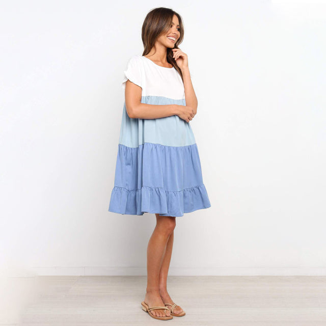 Jovita - Schattierungen des Sonnenuntergangs:  Verspieltes Kleid mit Farbblöcken in Weiß, Beige und Goldorange